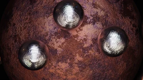 Rusty metal sphere with rolling silver metallic spheres looping 3D animation Stock-Footage 195099412