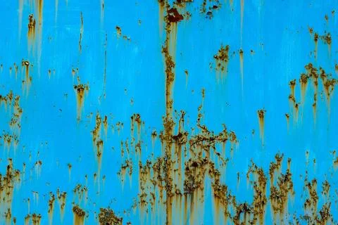 Rusty metal surface with blue paint and corrosion outdoors Stock Photos