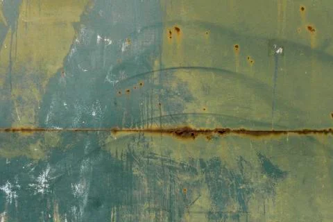 Rusty metal surface with colored paint flaking and cracking texture Stock Photos