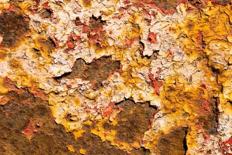 Rusty metal surface with paint flaking and cracking texture Stock Photos