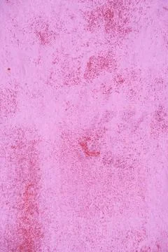 Rusty metal surface painted with rough strokes of paint, changed color, backg Foto stock