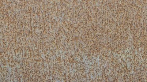 Rusty metal surface rust tones metal light iron panel worn steampunk backgrou Stock Photos