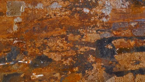 A rusty metal surface. A rusted metal surface; metal damaged by corrosion. Vídeos de archivo 343121151