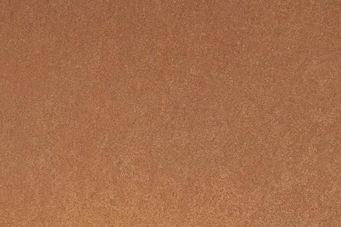 Rusty metal surface with speckled texture and pattern. Stock Photos