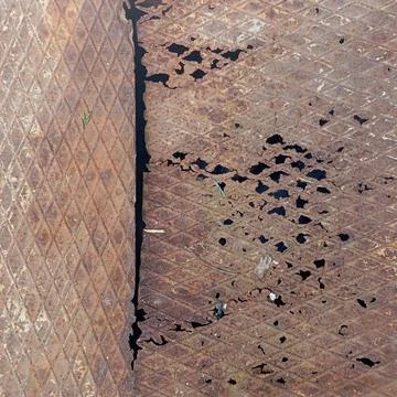 Rusty Metal Surface Texture with Corrosion and Holes Fotos de archivo