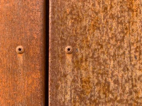 Rusty metal surface, texture for design. Rusty background with space for text Stock Photos