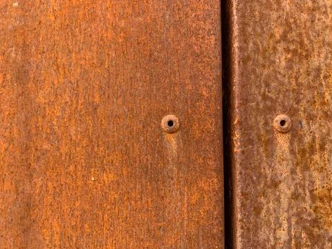 Rusty metal surface, texture for design. Rusty background with space for text Stock Photos