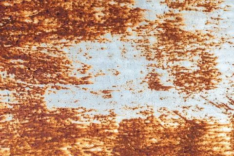 Rusty metal texture for the background. Corrosion of the painted surface Stock Photos
