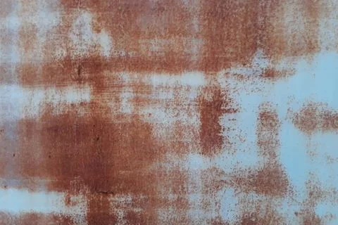 Rusty metal wall,old sheet of iron covered with rust background Stock Photos
