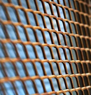 Rusty metallic net Stock Photos