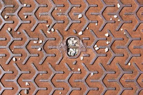 Rusty metallic textured surface with pebbles Stock Photos