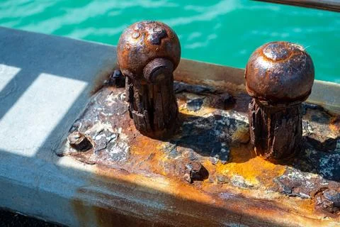 Rusty moorings on the dock Stock Photos