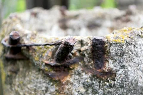 A rusty nail in the column Stock Photos