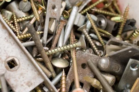 Rusty nails and tapping screws in a bucket Stock Photos