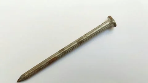 Rusty nails on a white background Stock Footage 313815215