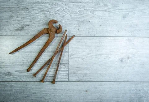 Rusty nails on white background, retro tool, rusty metal, background, vintage Stock Photos