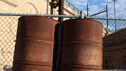 Rusty oil drums close Stock Footage 97095215