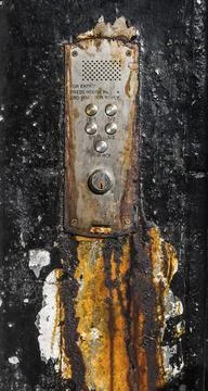 A Rusty Old Buzzer Or Intercom System For Flats In Glasgow, Scotland, United Foto stock