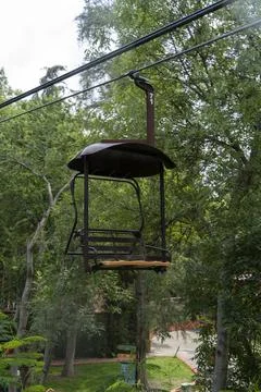 Rusty old cable car, cable car ride in the rain, views of the canyon, vegetation Stock Photos