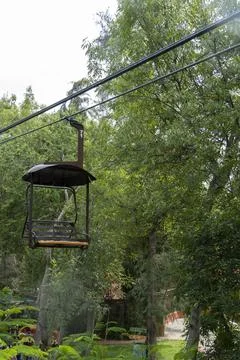 Rusty old cable car, cable car ride in the rain, views of the canyon, vegetation Stock Photos