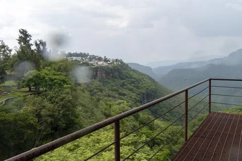 Rusty old cable car, cable car ride in the rain, views of the canyon, vegetation Stock Photos
