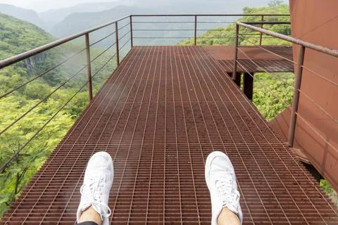 Rusty old cable car, cable car ride in the rain, views of the canyon, vegetation Stock Photos