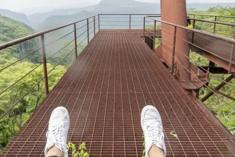 Rusty old cable car, cable car ride in the rain, views of the canyon, vegetation Stock Photos