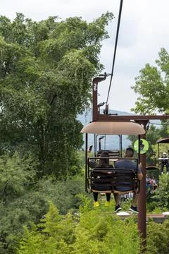 Rusty old cable car, cable car ride in the rain, views of the canyon, vegetation Stock Photos