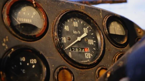 Rusty old car speedometer in the rays of the setting sun Stock Footage 108396015