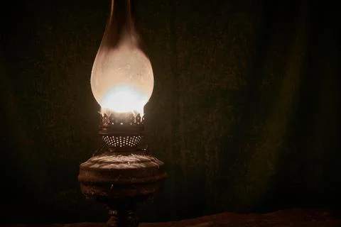 Rusty, old, cobwebbed and dusty kerosene lamp prepared for Halloween. Stock Photos