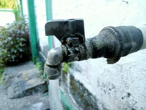 Rusty old faucet Stock Photos