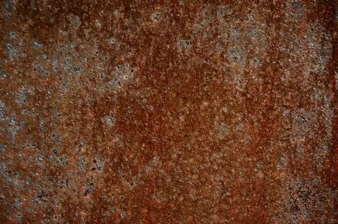 Rusty old iron close-up. Dark background. Abstract background.. Stock Photos