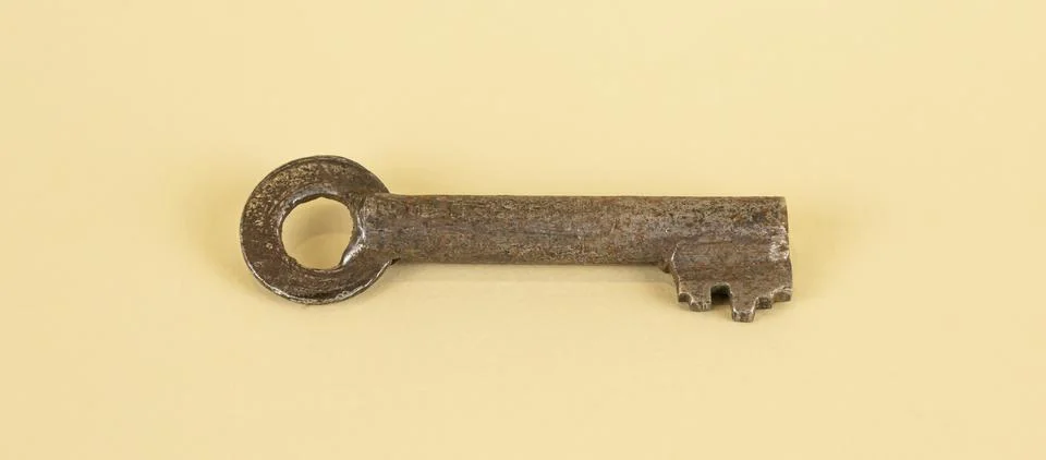 A rusty old key. an old key to an old lock. Stock Photos