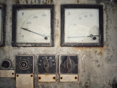 Rusty old large voltmeter and amperemeter Stock Photos