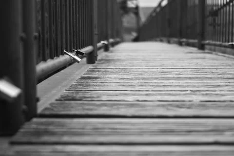 Rusty old lock on Lovers Lock Bridge. Shallow depth of field. Stock Photos