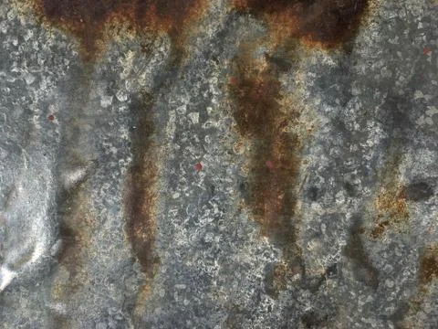 Rusty, old, rough, metal texture. Dark rusty metal texture background for int Stock Photos