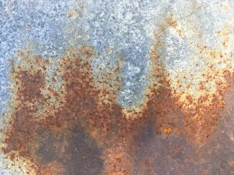 Rusty, old, rough, metal texture. Dark rusty metal texture background for int Stock Photos