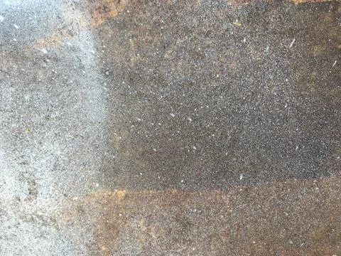 Rusty, old, rough, metal texture. Dark rusty metal texture background for int Stock Photos
