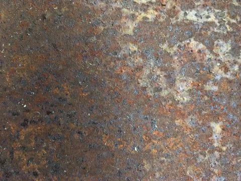 Rusty, old, rough, metal texture. Dark rusty metal texture background for int Stock Photos