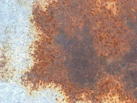 Rusty, old, rough, metal texture. Dark rusty metal texture background for int Stock Photos