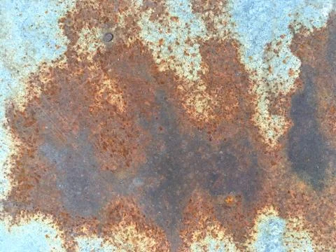 Rusty, old, rough, metal texture. Dark rusty metal texture background for int Stock Photos