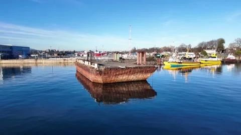 Rusty old ship moored at Ogden Point Terminal Pier in Victoria BC Canada Stock Footage 294951380