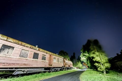 Rusty old train car with some stars in the sky Foto stock