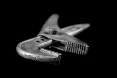Rusty, old workshop keys. Hydraulic keys on a black table in a workshop. Blac 스톡 사진