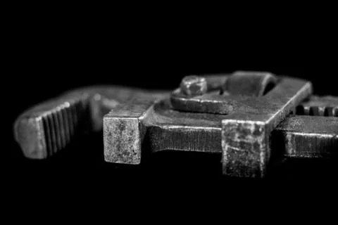 Rusty, old workshop keys. Hydraulic keys on a black table in a workshop. Blac Stock Photos