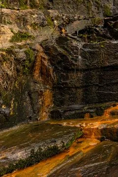 Rusty Orange Stains Run Down Fordyce Ricks Pond Dam Photos