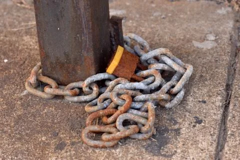 Rusty Padlock on a Chain Stock Photos