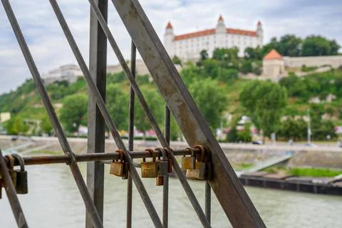 Rusty padlocks on Most SNP bridge. Bratislava Castle Stock Photos