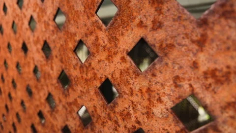 Rusty perforated metal sheet with diamond pattern Stock Footage 344744312