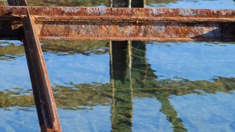 The rusty pier with mediterranean waves. Stock Footage 268900477